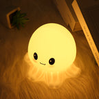 Jellyfish Night Lamp glowing warm in a bedroom
